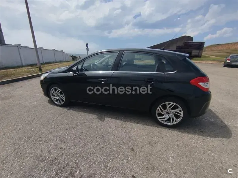 Usado Citroën C4 120 CV (88 kW) 2012 Negro Berlina