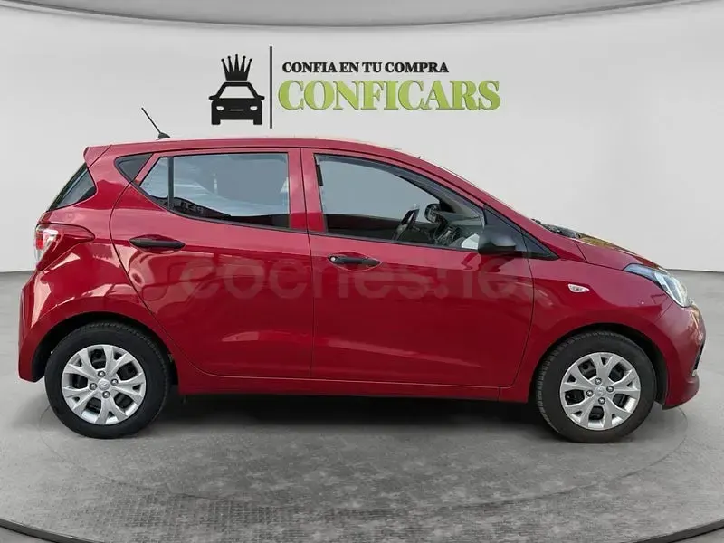 Usado Hyundai i10 66 CV (48 kW) 2015 Granate Utilitario