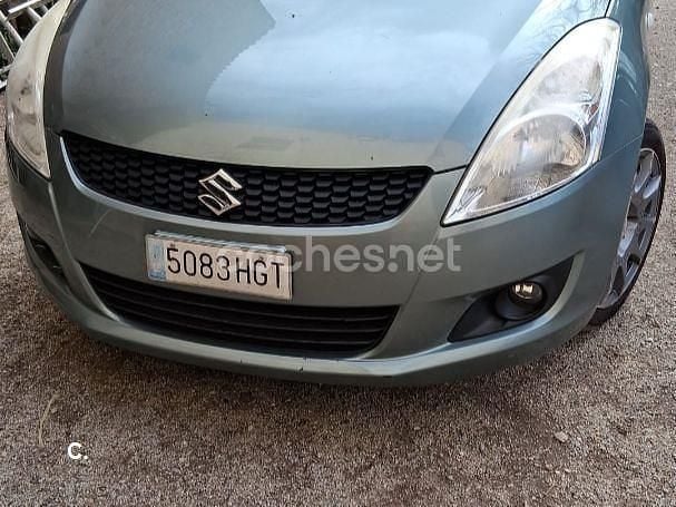 Usado Suzuki Swift GL 95 CV (69 kW) 2011 Gris / plata Utilitario