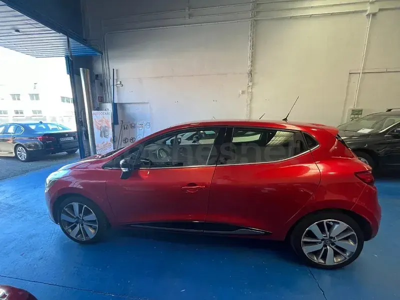 Usado Renault Clio IV Dynamique 90 CV (66 kW) 2015 Granate Berlina