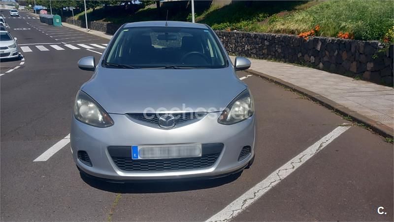 Usado Mazda 2 Active 86 CV (63 kW) 2009 Gris / plata Utilitario