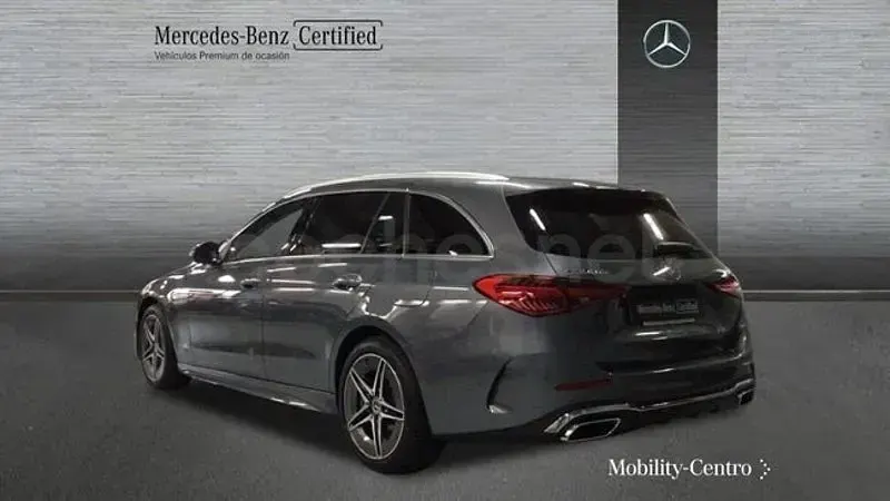 Usado Mercedes C300e AMG line 313 CV (230 kW) 2024 Gris selenita Familiar