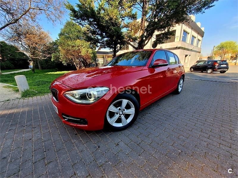 Usado BMW 118 Sport Line 143 CV (105 kW) 2012 Rojo Utilitario
