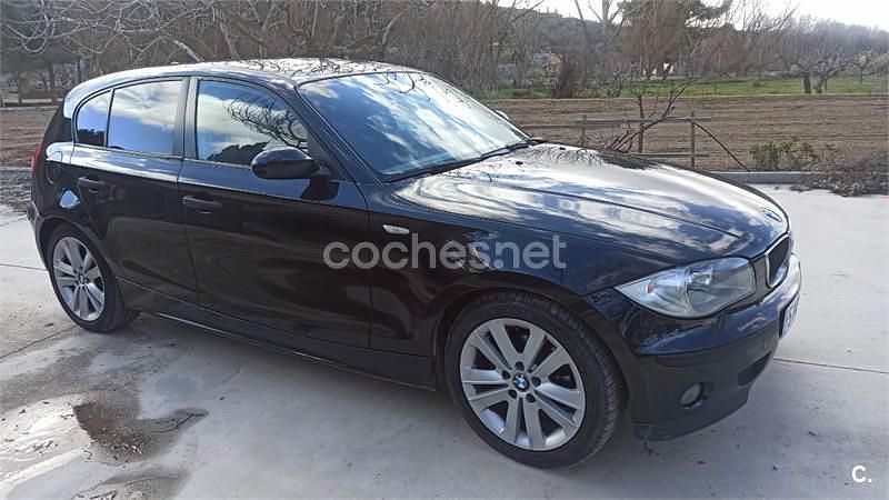 Usado BMW 118 122 CV (89 kW) 2006 Negro Utilitario