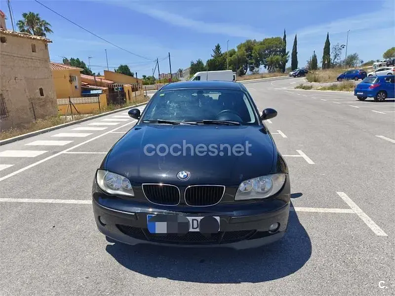 Usado BMW 118 122 CV (89 kW) 2006 Negro Utilitario
