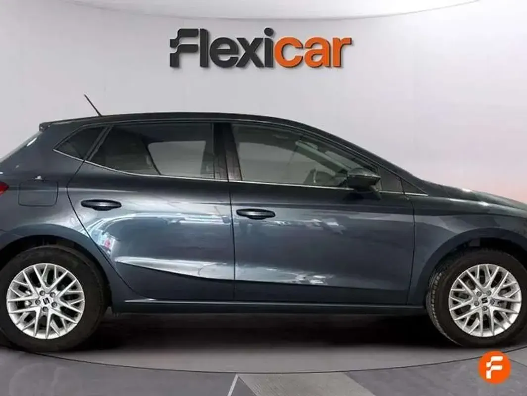 Usado Seat Ibiza 116 CV (85 kW) 2024 Gris Utilitario
