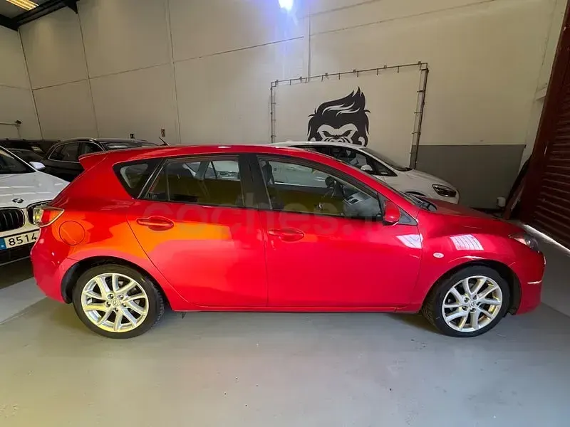 Usado Mazda 3 115 CV (84 kW) 2013 Granate Berlina