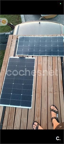 Usado VW Caravelle 102 CV (75 kW) 2007 Granate Monovolumen