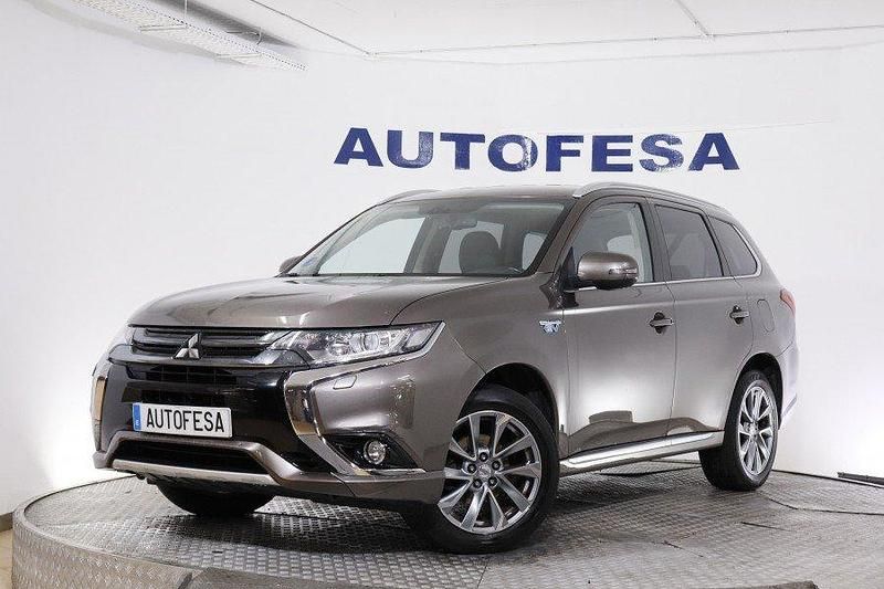 Marron Usado 2015 Mitsubishi Outlander P-HEV | 11.450 € - Imagen 1/4