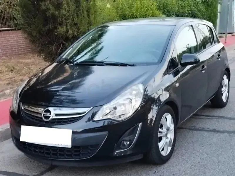 Usado Opel Corsa Color Edition 100 CV (73 kW) 2012 Negro Utilitario