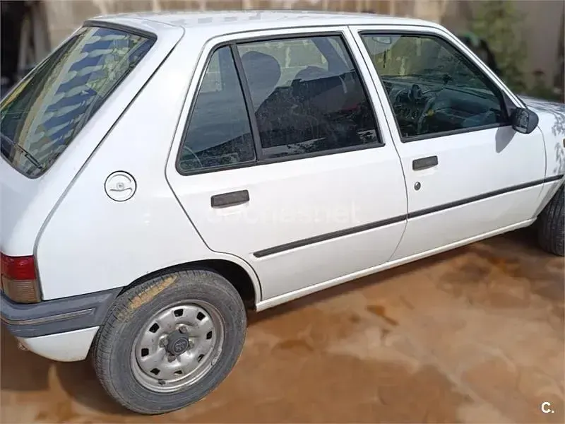 Usado Peugeot 205 60 CV (44 kW) 1996 Blanco Utilitario