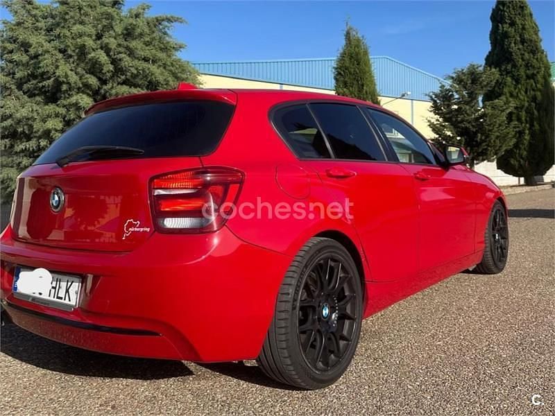 Usado BMW 118 Sport Line 143 CV (105 kW) 2012 Rojo Utilitario