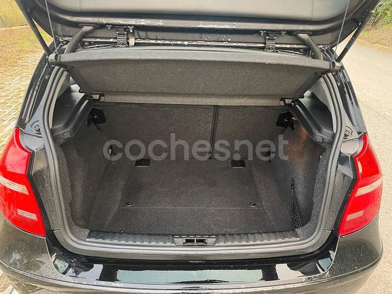 Usado BMW 116 122 CV (89 kW) 2010 Negro Utilitario