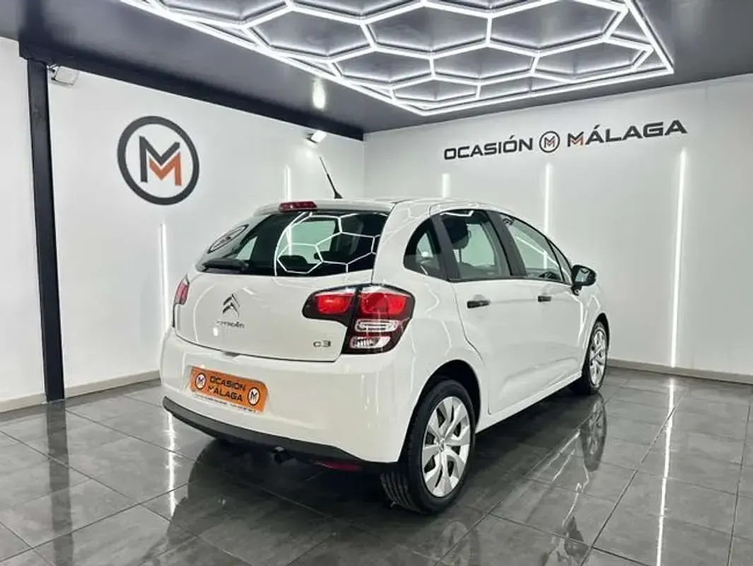 Usado Citroën C3 Attraction 68 CV (50 kW) 2014 Plateado Utilitario