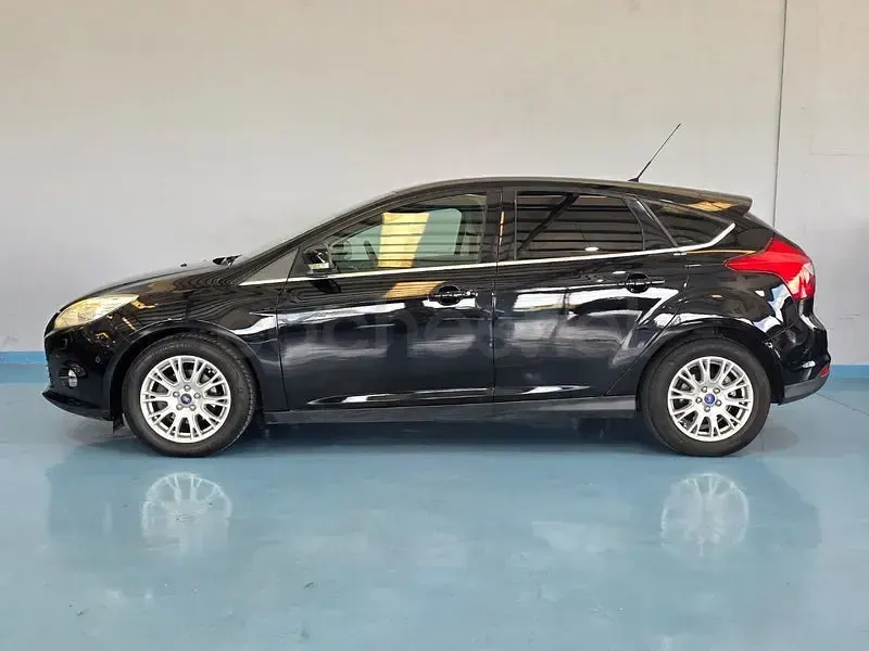Usado Ford Focus Titanium 115 CV (84 kW) 2012 Negro Berlina