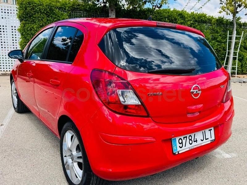 Usado Opel Corsa Selective 95 CV (69 kW) 2013 Rojo Utilitario