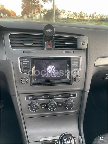 Usado VW Golf VII 105 HP (77 kW) 2013 Cinzento Sedan