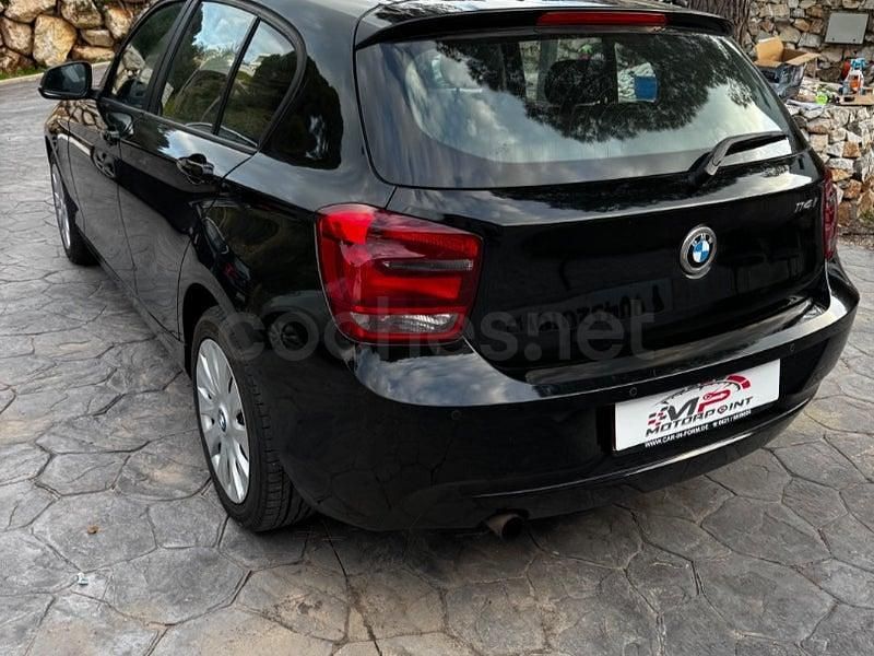 Usado BMW 114 Comfort Edition 102 CV (75 kW) 2012 Rojo Utilitario