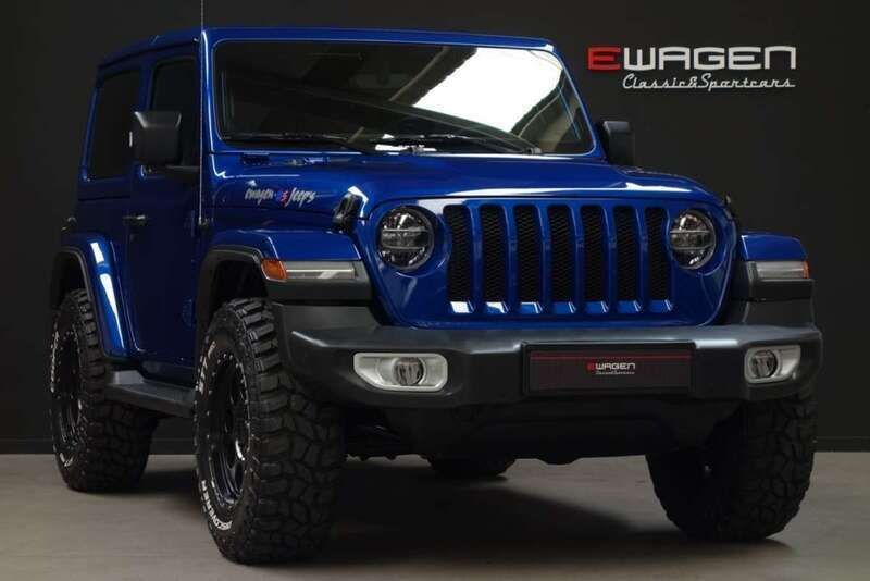 Ocean blue Usado 2019 Jeep Wrangler Sahara SUV | 58.990 € (Caro) - Imagen 1/4