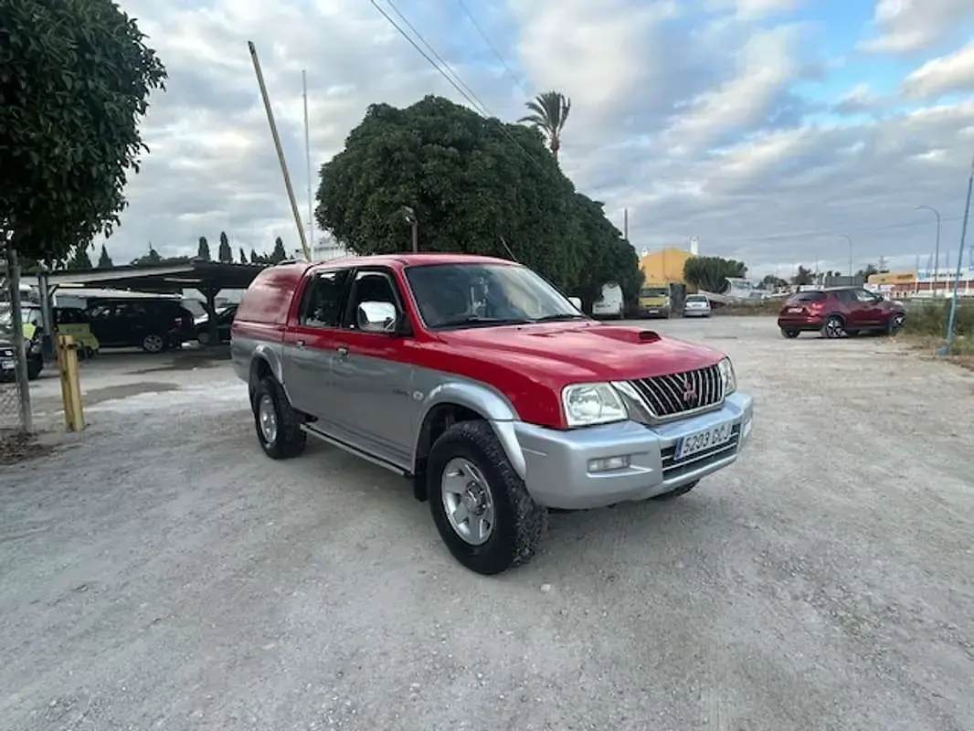 Usado Mitsubishi L200 114 CV (83 kW) 2004 Rojo Pickup/Camioneta