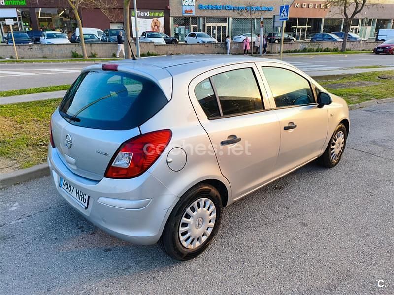 Używany Opel Corsa Selective 75 KM (55 kW) 2013 Biały Hatchback