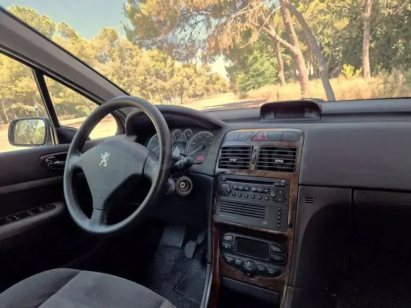 Usado Peugeot 307 110 CV (80 kW) 2004 Gris / plata Berlina