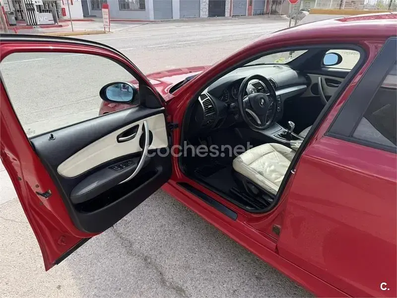 Usado BMW 118 122 CV (89 kW) 2008 Rojo Utilitario