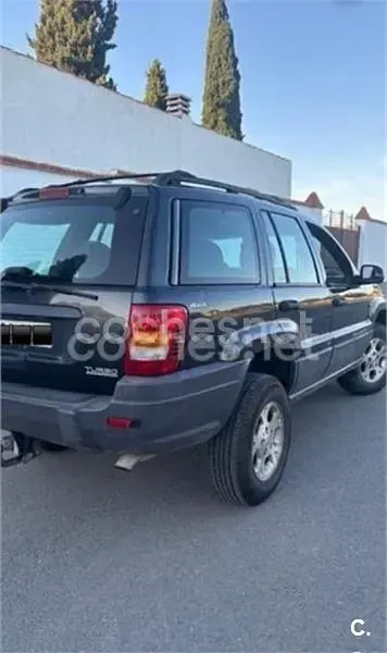 Usado Jeep Grand Cherokee Laredo 140 CV (102 kW) 1999 Azul SUV