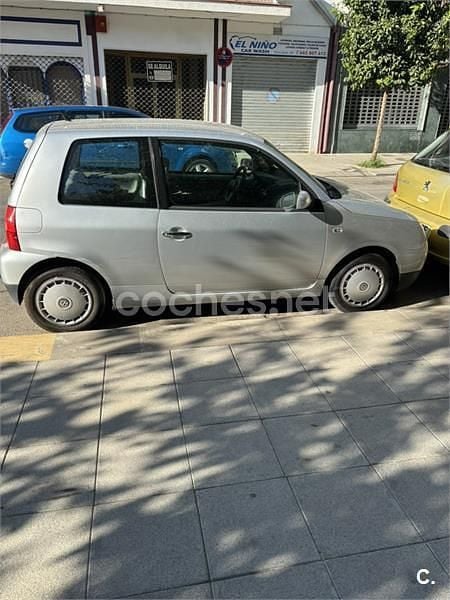 Usado VW Lupo 61 CV (44 kW) 2004 Gris / plata Utilitario