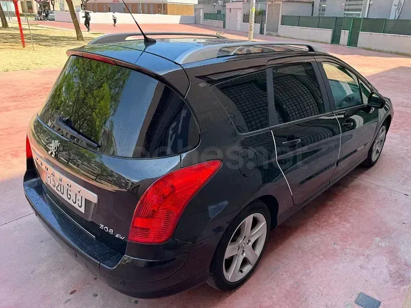 Usado Peugeot 308 SW Premium 150 CV (110 kW) 2009 Negro Familiar
