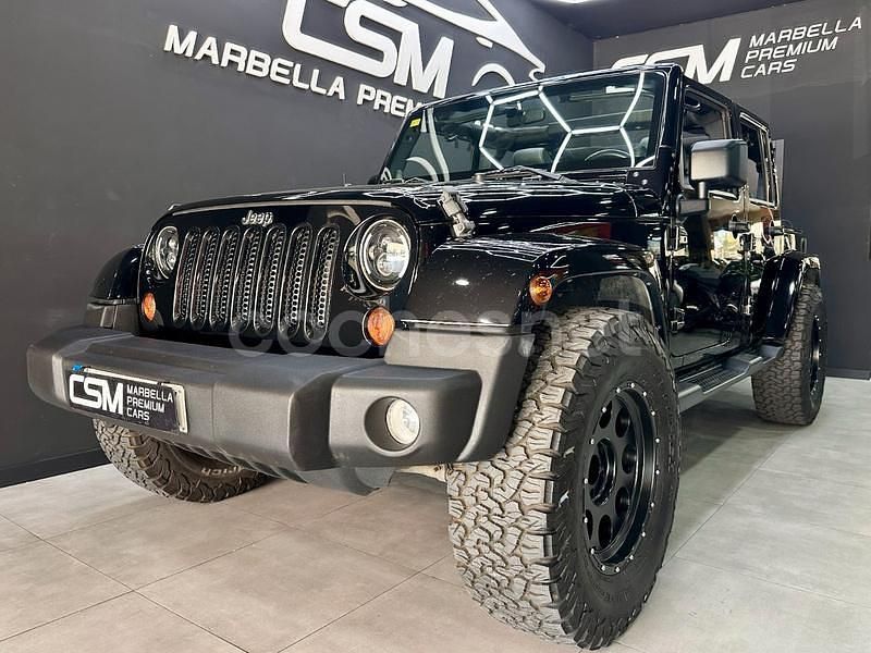 Negro Usado 2012 Jeep Wrangler Unlimited Sahara SUV | 32.990 € (Precio justo) - Imagen 1/4