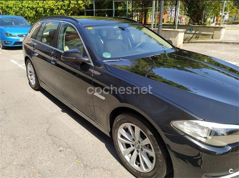 Negro Usado 2014 BMW 518 Familiar | 9000 € - Imagen 1/4