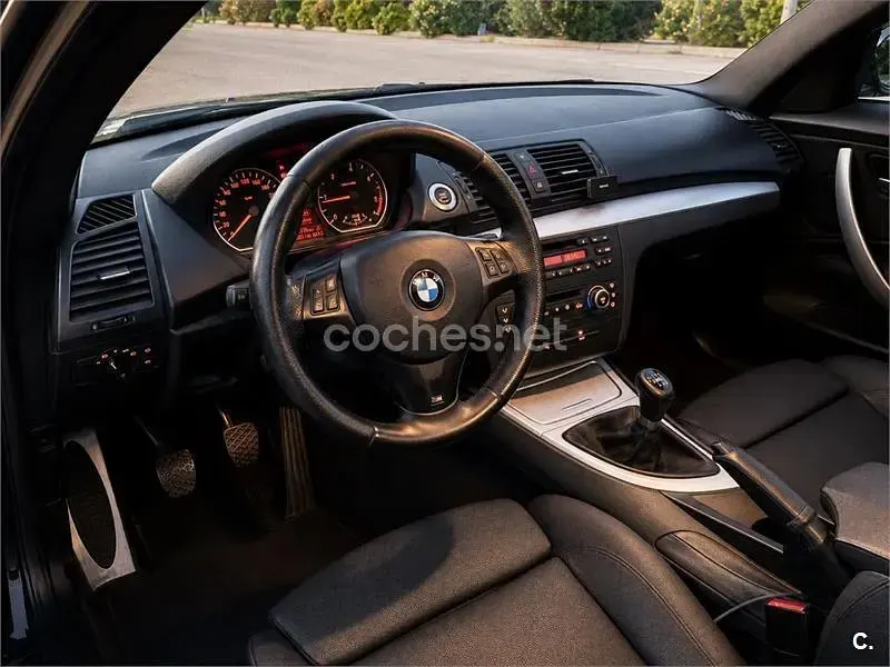 Usado BMW 116 115 CV (84 kW) 2009 Negro Utilitario