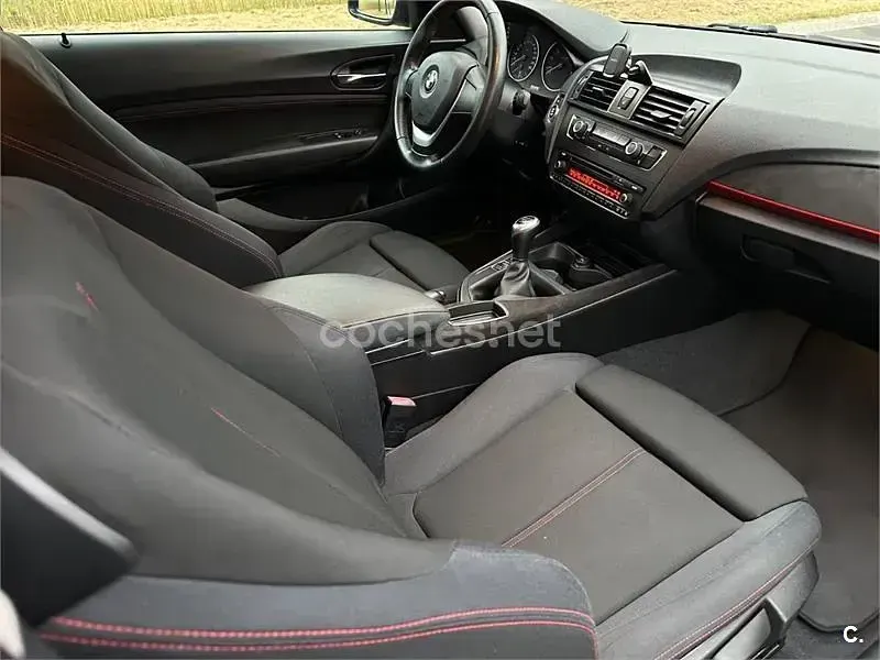 Usado BMW 116 Sport Line 122 CV (89 kW) 2013 Negro Utilitario
