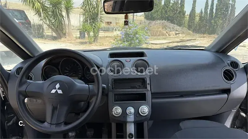 Usado Mitsubishi Colt Inform 75 CV (55 kW) 2005 Negro Utilitario