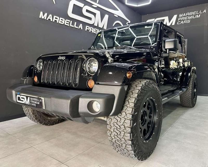 Negro Usado 2012 Jeep Wrangler Unlimited Sahara SUV | 31.990 € (Precio justo) - Imagen 1/4