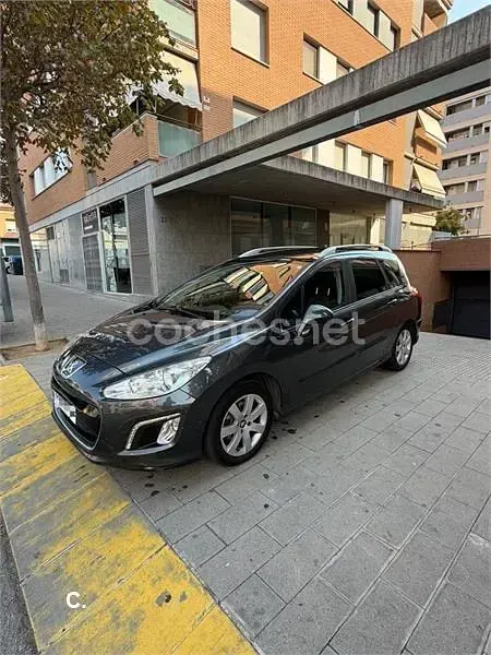 Usado Peugeot 308 SW Sportium 112 CV (82 kW) 2012 Gris / plata Familiar