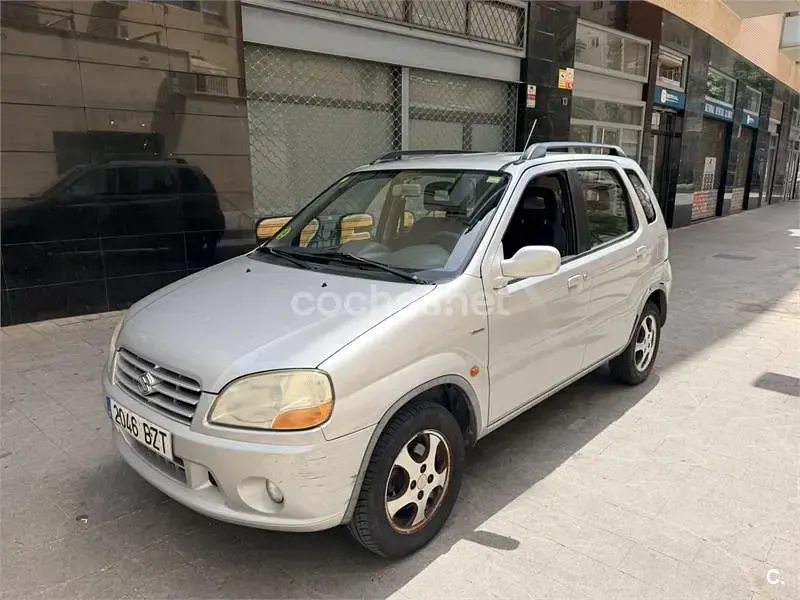 Usado Suzuki Ignis 83 CV (61 kW) 2002 Gris / plata Utilitario