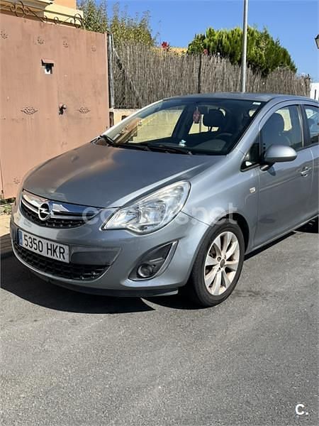 Gris / plata Usado 2012 Opel Corsa Selective Berlina | 4795 € (Precio justo) - Imagen 1/4
