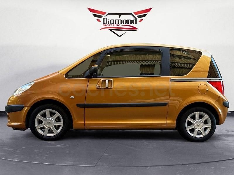 Usado Peugeot 1007 75 CV (55 kW) 2006 Naranja Monovolumen