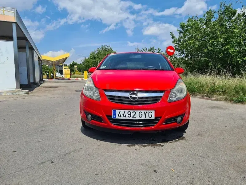 Usado Opel Corsa Selective 95 CV (69 kW) 2011 Rojo Utilitario