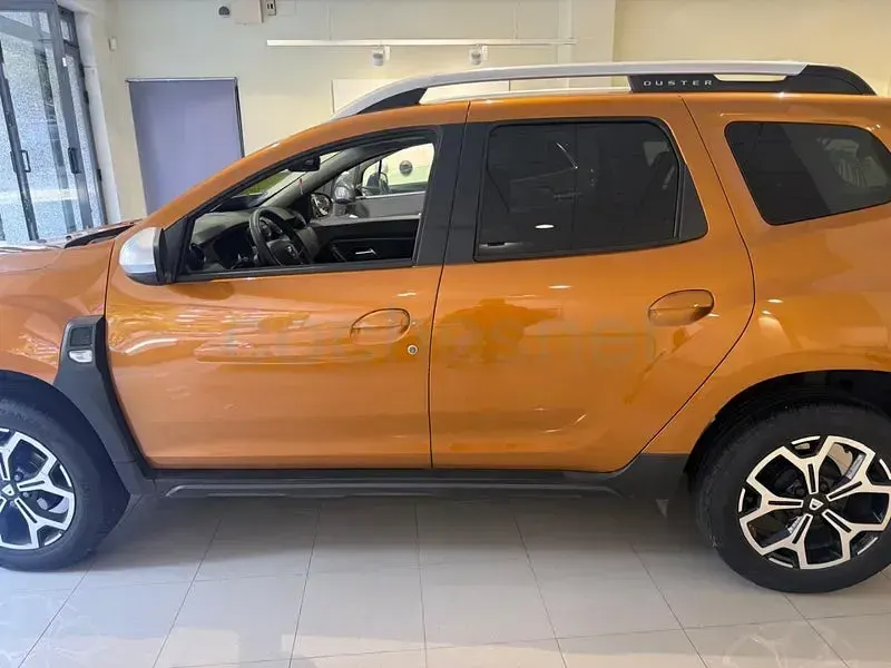 Usado Dacia Duster Prestige 115 CV (84 kW) 2019 Naranja SUV