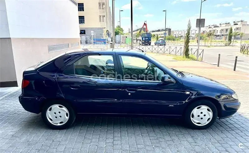 Usado Citroën Xsara Attraction 71 CV (52 kW) 2000 Azul Berlina