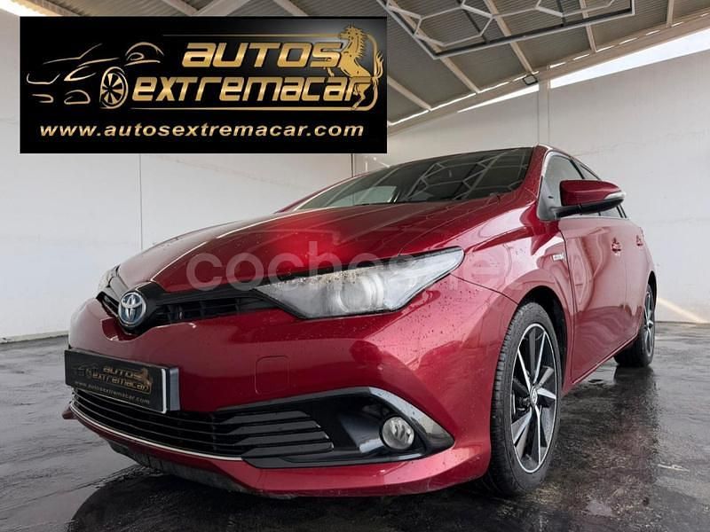 Rojo Usado 2018 Toyota Auris Hybrid Active Berlina | 12.799 € (Buen precio) - Imagen 1/4