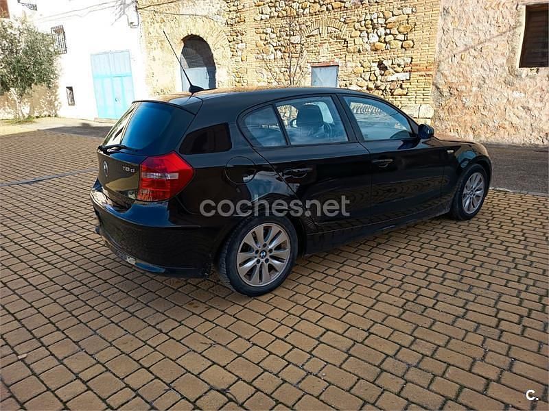 Usado BMW 118 122 CV (89 kW) 2007 Negro Utilitario
