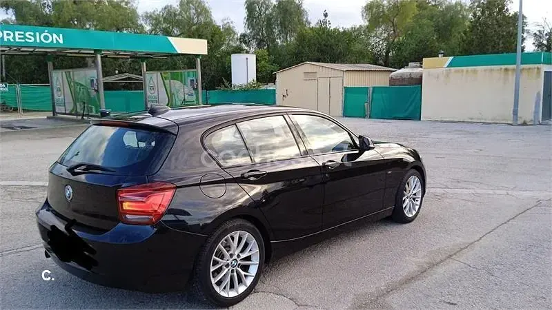 Usado BMW 120 Sport Line 184 CV (135 kW) 2012 Negro Utilitario