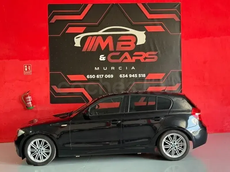 Usado BMW 118 143 CV (105 kW) 2009 Negro Utilitario