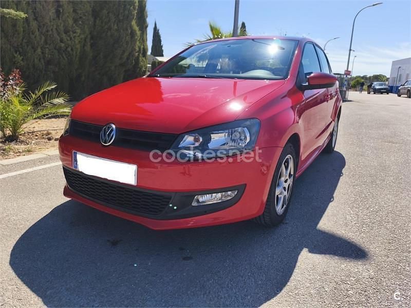 Używany VW Polo Advance 75 KM (55 kW) 2014 Czerwony Sedan/Limuzyna