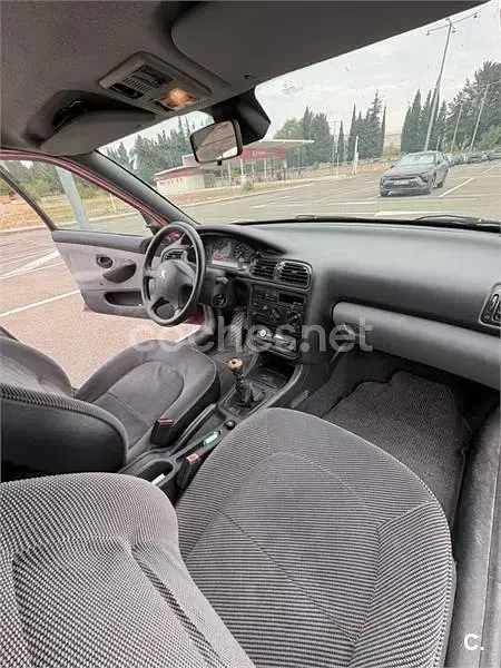 Usado Peugeot 406 110 CV (80 kW) 1998 Granate Berlina