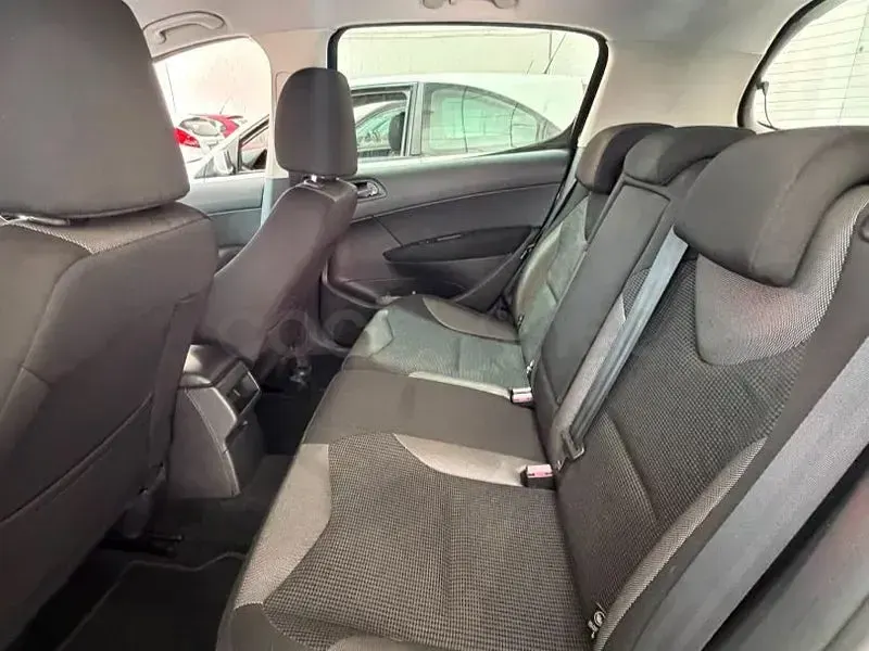 Usado Peugeot 308 Access 112 CV (82 kW) 2012 Marrón Berlina